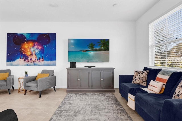 living area with light tile patterned floors