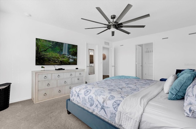 bedroom featuring light carpet, ceiling fan, and visible vents