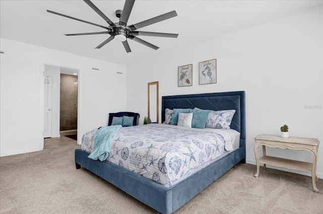 carpeted bedroom with baseboards and a ceiling fan