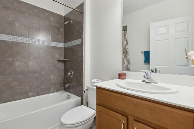 full bathroom featuring shower / bathing tub combination, vanity, and toilet