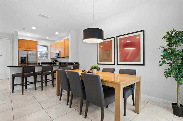 dining area featuring recessed lighting, visible vents, baseboards, and light tile patterned floors