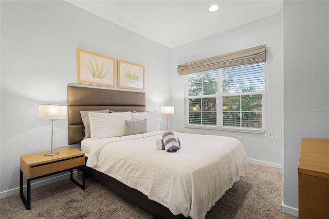 carpeted bedroom with baseboards and recessed lighting