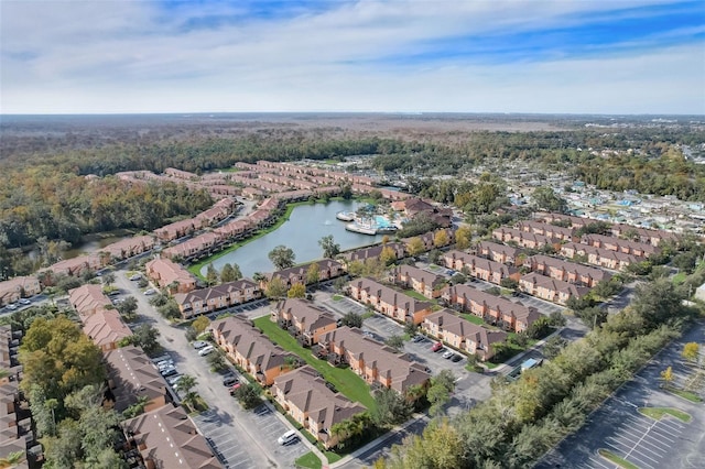 aerial view featuring a water view and a residential view