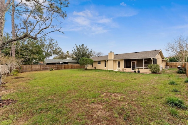 1581 Monica Joy Cir, Longwood, FL 32779 - view of yard featuring a fenced backyard and a sunroom