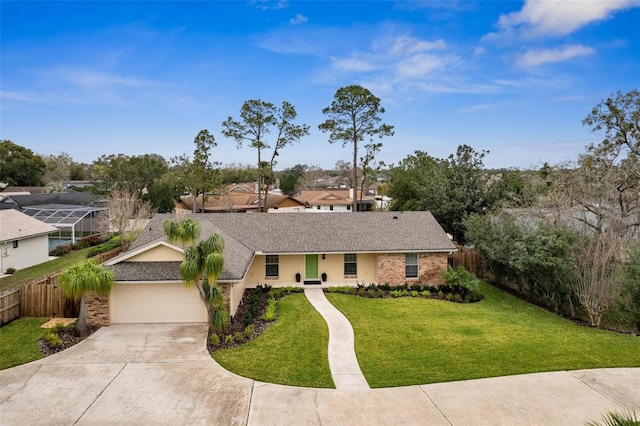 1581 Monica Joy Cir, Longwood, FL 32779 - ranch-style house with a garage, fence, a front lawn, and concrete driveway