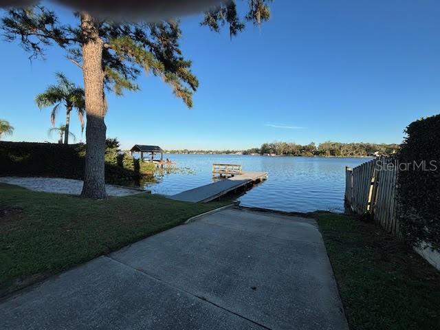 1581 Monica Joy Cir, Longwood, FL 32779 - view of dock featuring a water view and a yard
