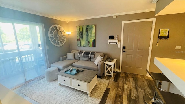 living area with dark wood finished floors and crown molding