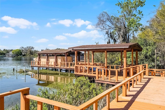 view of dock with a water view