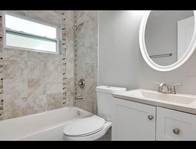 full bath with vanity, toilet, and shower / bathtub combination