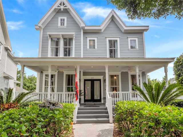 view of front of property with a porch and a ceiling fan