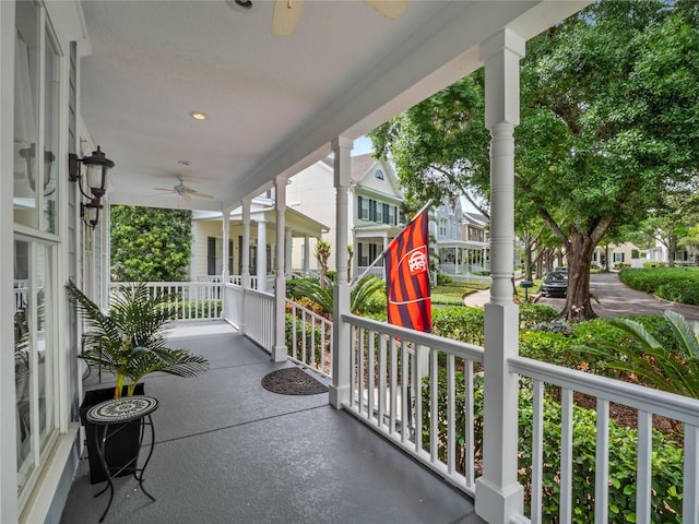 view of patio featuring a residential view, covered porch, and ceiling fan