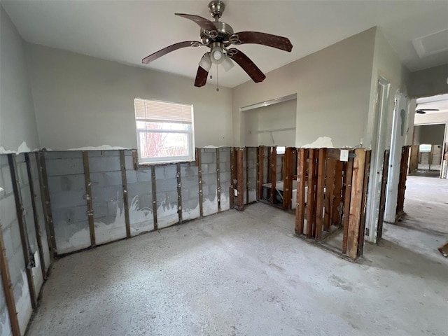 unfurnished room with a ceiling fan