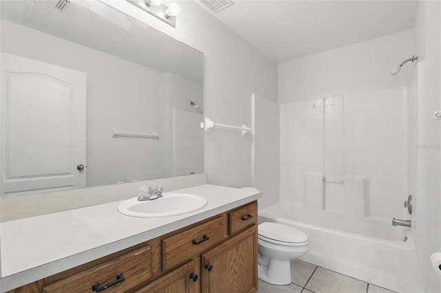 full bathroom featuring visible vents, toilet, washtub / shower combination, vanity, and tile patterned flooring