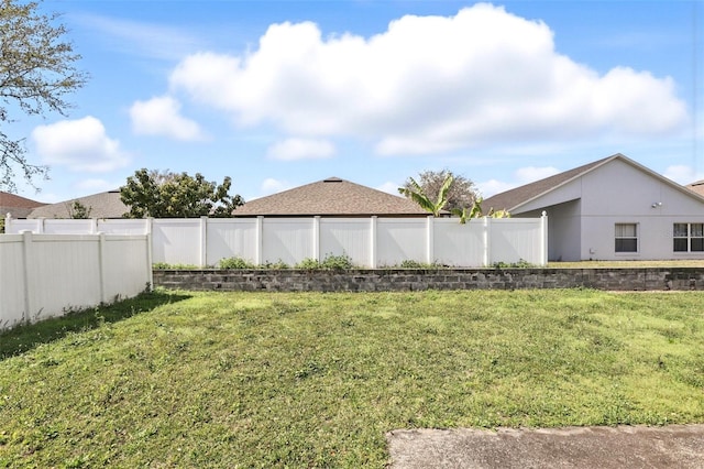 view of yard with fence