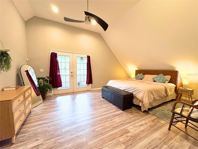 bedroom with lofted ceiling, light wood-style flooring, a ceiling fan, access to outside, and french doors