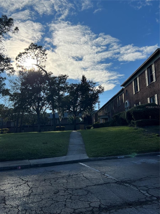 view of road with curbs and sidewalks