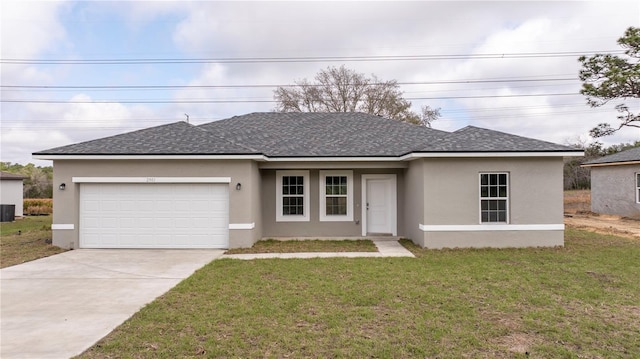 ranch-style house featuring roof with shingles, driveway, stucco siding, a front lawn, and a garage