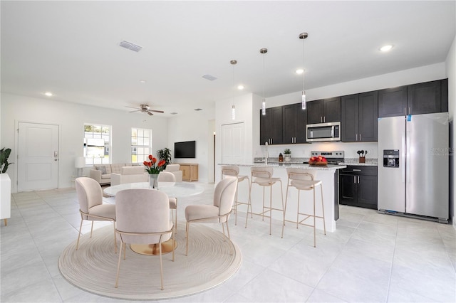 dining area with recessed lighting, visible vents, ceiling fan, and light tile patterned floors