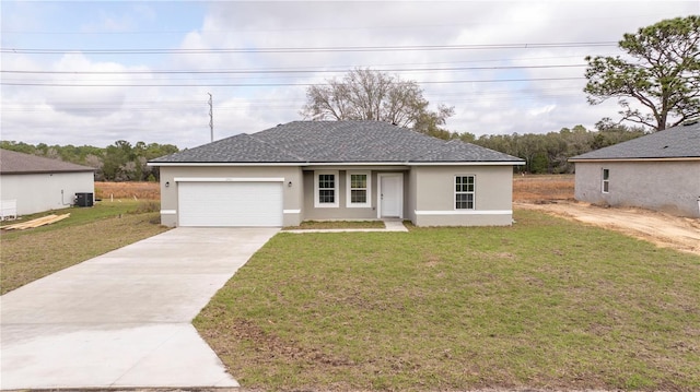 view of front of house with a front lawn, concrete driveway, cooling unit, and stucco siding