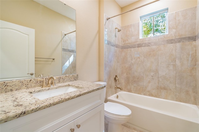 bathroom featuring shower / bathtub combination, vanity, and toilet