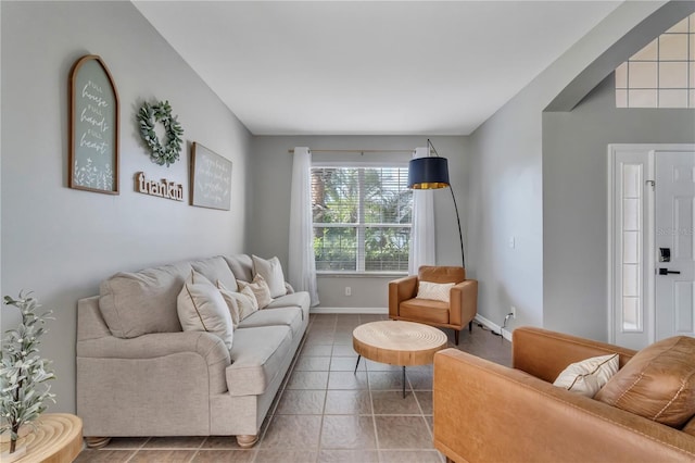 tiled living room with baseboards