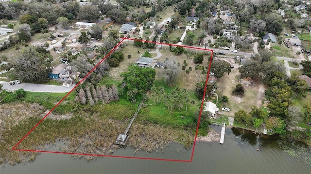 aerial view with a residential view and a water view