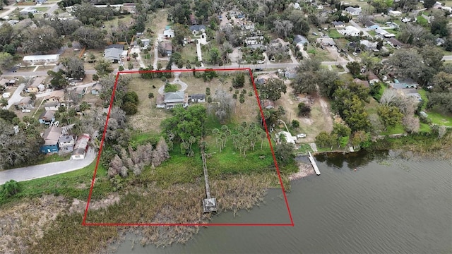 aerial view featuring a water view and a residential view