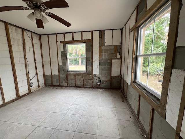 unfurnished room with ceiling fan