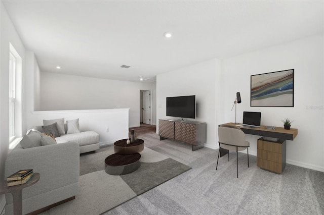 living room with carpet, visible vents, baseboards, and recessed lighting