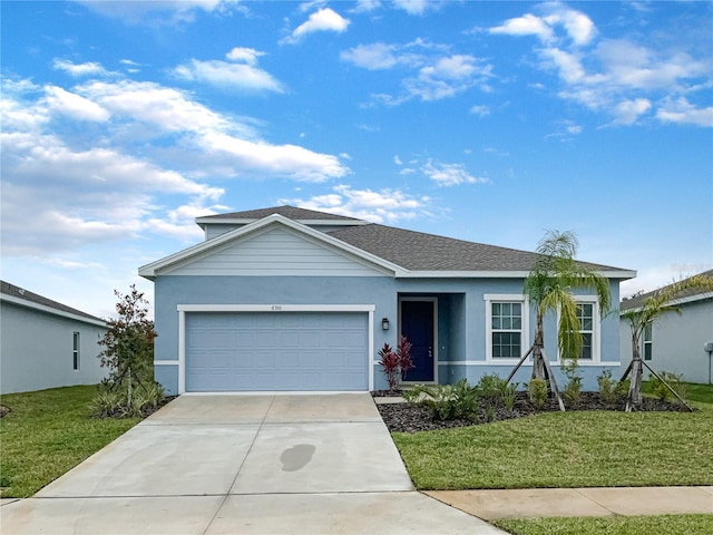 single story home featuring a garage, a shingled roof, concrete driveway, stucco siding, and a front yard