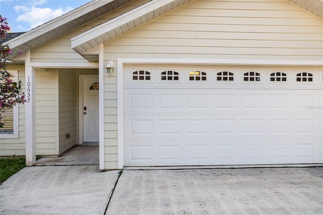 garage with driveway