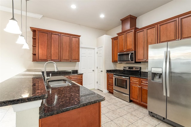 kitchen with a peninsula, a sink, hanging light fixtures, appliances with stainless steel finishes, and open shelves