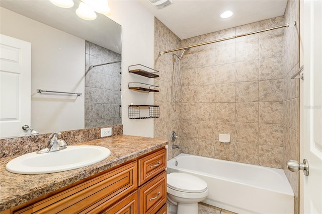 full bathroom with toilet, vanity, and shower / tub combination