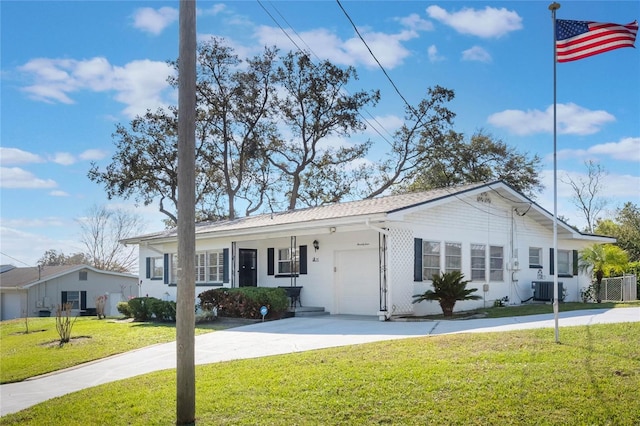 ranch-style house featuring a garage, cooling unit, a front lawn, and concrete driveway