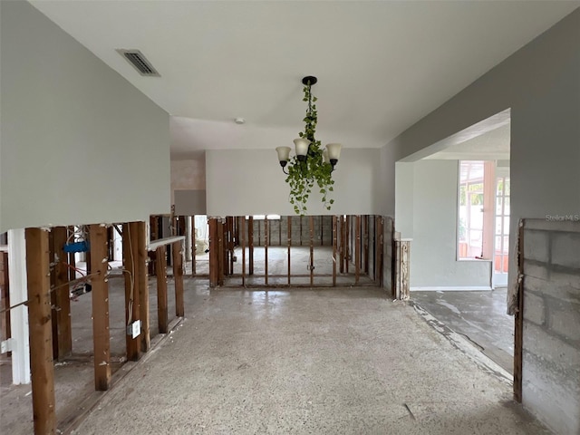 4435 Huntington St NE, Saint Petersburg, FL 33703 - spare room with visible vents and a notable chandelier