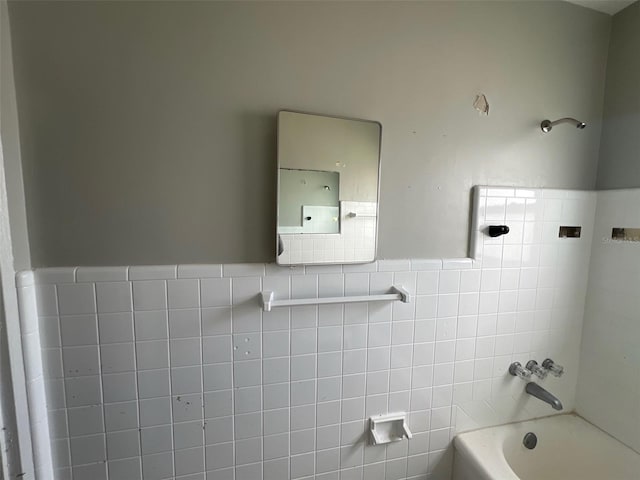 4435 Huntington St NE, Saint Petersburg, FL 33703 - full bathroom featuring tile walls and bathing tub / shower combination