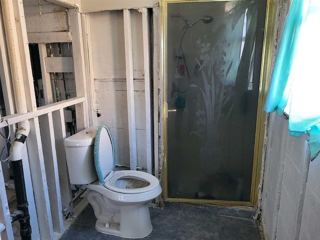 full bathroom with toilet and a shower stall