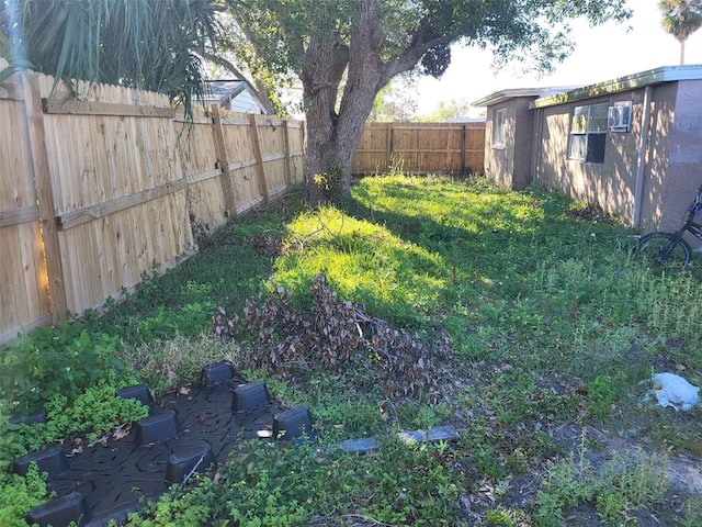 view of yard featuring a fenced backyard