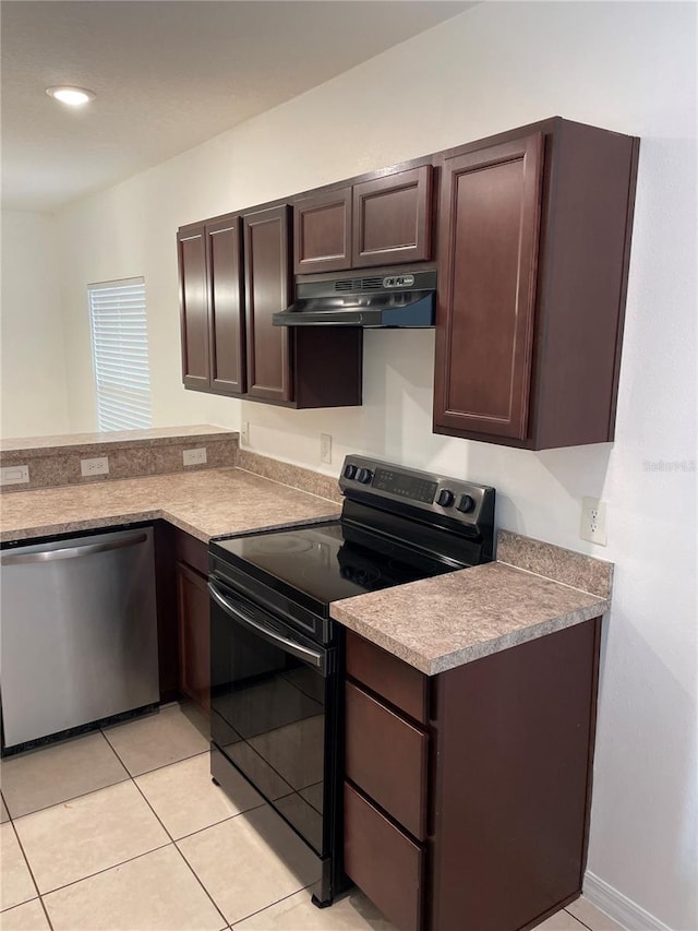 kitchen with light tile patterned floors, black range with electric stovetop, dark brown cabinetry, dishwasher, and under cabinet range hood