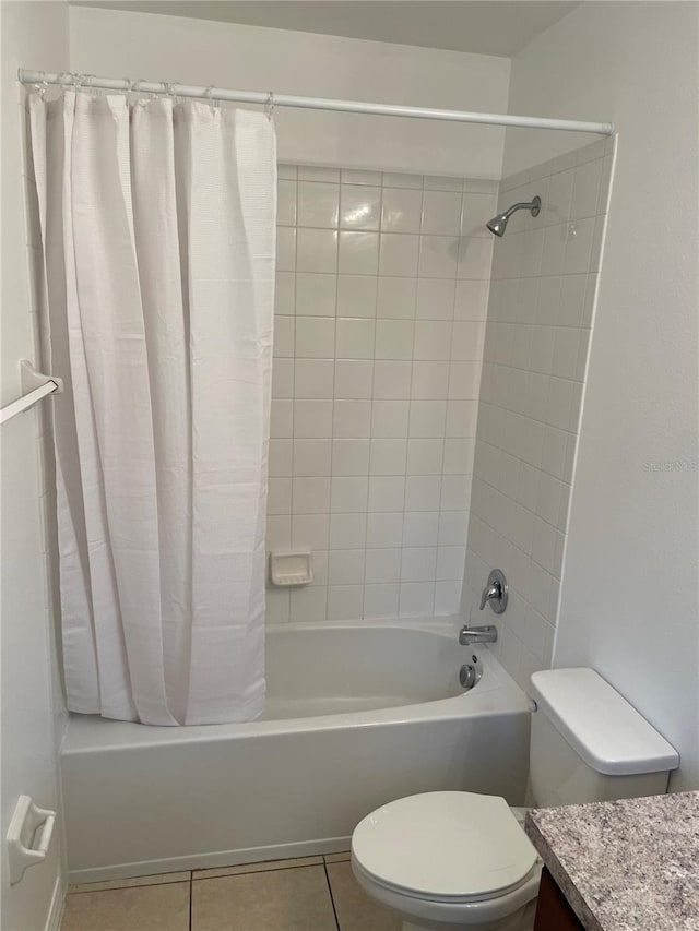 full bathroom featuring tile patterned flooring, vanity, toilet, and shower / bath combo