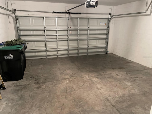 garage featuring a garage door opener