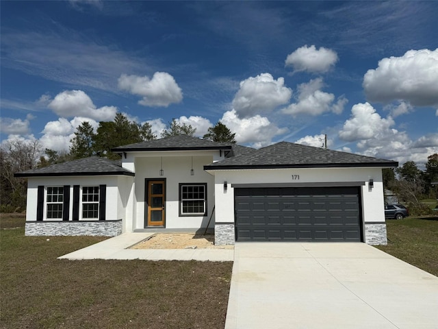 prairie-style house with stucco siding, an attached garage, stone siding, driveway, and a front lawn