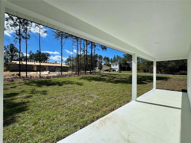 view of yard featuring a patio area