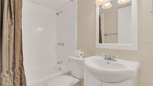 full bath with toilet, shower / tub combo, and vanity