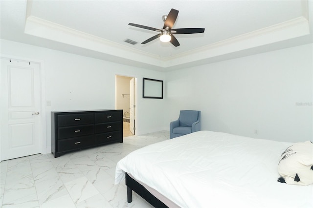 bedroom featuring ornamental molding, marble finish floor, a tray ceiling, and visible vents