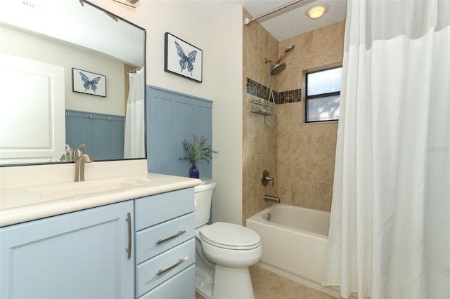 bathroom with toilet, shower / bath combination with curtain, and vanity