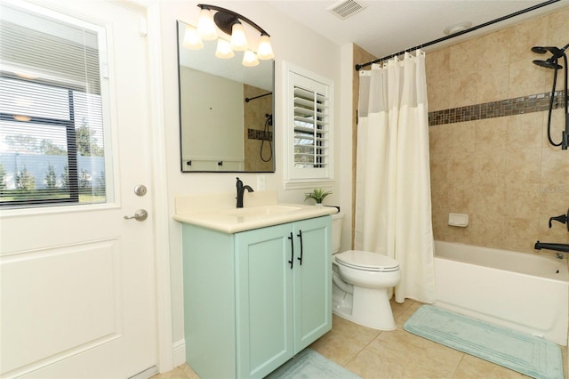 bathroom with shower / bath combo, visible vents, toilet, tile patterned flooring, and vanity