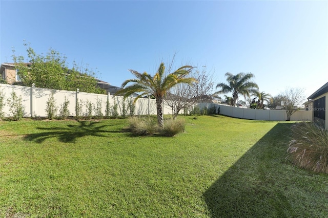 view of yard featuring a fenced backyard