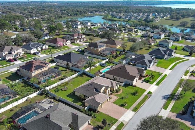 aerial view with a water view and a residential view