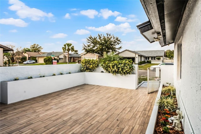 view of patio / terrace featuring fence private yard and a residential view